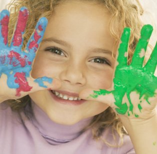 Picture of child with paint on hands